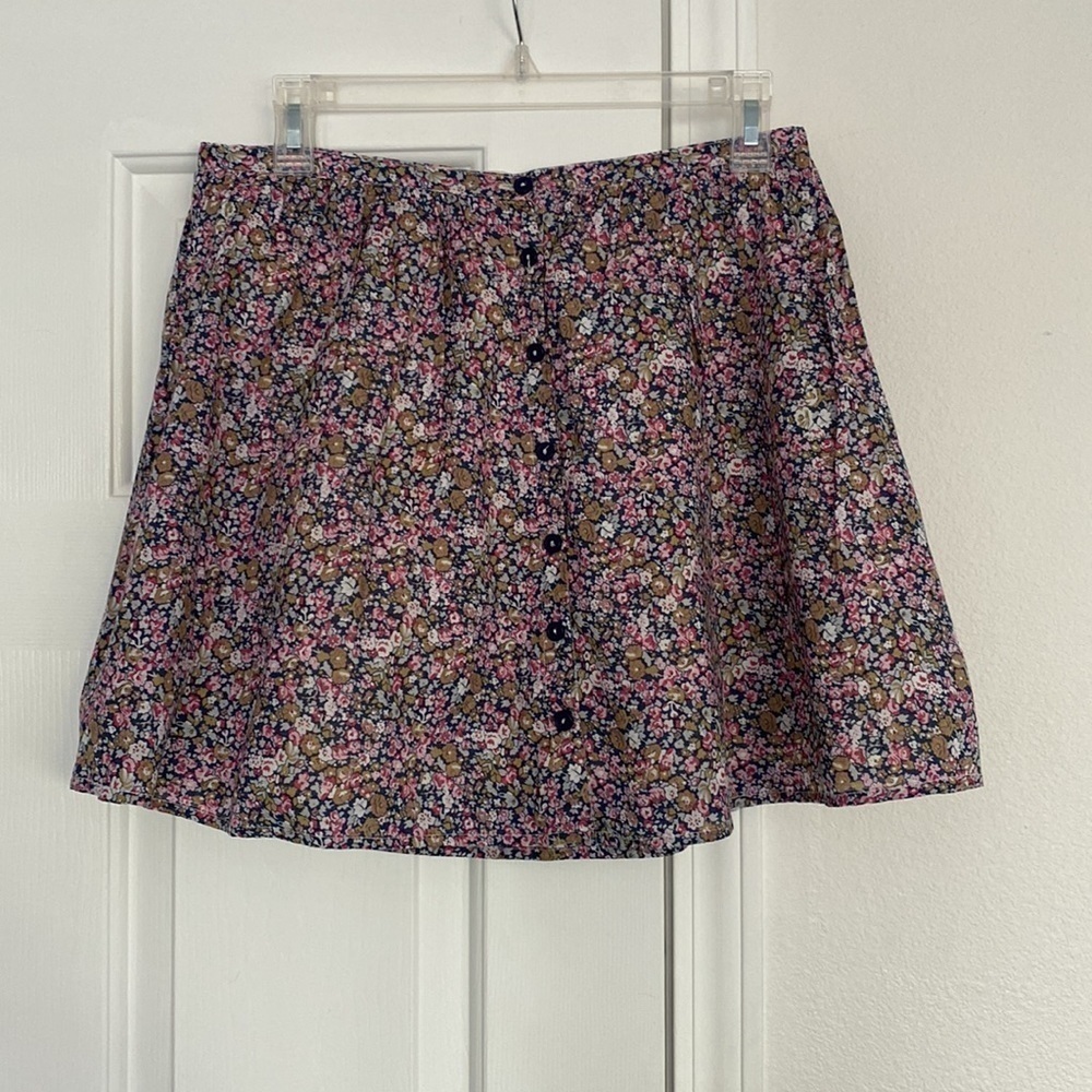 Twenty One floral mini skirt with buttons.